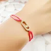 Charm-Armbänder, einfach für Damen, Kupfer-Mikro-eingelegter Zirkon mit einer verschiebbaren Perle, handgewebtes rotes Seil, klassisches Accessoire