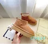 Femmes Ultra Mini botte plate-forme de créateur bottes de neige hommes en cuir véritable chaud cheville fourrure chaussons chaussure de luxe