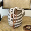 Cesta de mujer Bolso de cubo Bolsos de paja Bolso de rafia Tote Beach Hombro Crossbody Bolsos de mujer Luxurys Diseñadores Bolsos Totes Monederos Verano