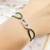 Charm-Armbänder, einfach für Damen, Kupfer-Mikro-eingelegter Zirkon mit einer verschiebbaren Perle, handgewebtes rotes Seil, klassisches Accessoire