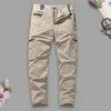 メンズパンツメンズカーゴソリッドカラー多目的ストリートウェアのズボンスタイリッシュなマルチポケットルーズフィット
