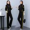 Kvinnors tvådelade byxor 2023 Spring New Korean Edition Fashion Style Contrast Panel dragkedja Tvådelat set