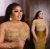 Sexy Arabic Evening Dresses Wear Gold Illusion Jewel Neck Long Sleeves Crystal Beads Mermaid Plus Size Celebrity Dresses Party Gowns