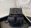 Sacs de soirée Mode Sac à dos Usine % 85% Vente en gros et au détail Nouveau Xiaoxiangfeng Duma Frog Caviar Diamondback Chain Double Pocket Litchi Pattern Backpack