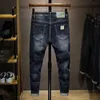 Jeans da uomo Jeans Hip Hop Uomo Elasticità Jeans strappati blu scuro per ragazzi Pantaloni slim fit moda streetwear Jeans uomo distrutto Vestiti patch W0413