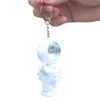 Keychains F19D Astronaut Keychain com o Sunset Projector Light Backpack Charm Pinging