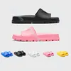 Sommer neue Sandale Designer Frauen Slide Mann Schuh Gummi geprägte Dreieck Komfort Plattform Tasman Slipper flach Mode Outdoor Schuh kostenloser Versand