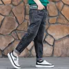 Jeans chłopcy wiosenne jeansy dżinsy nastolatki plastry splotowe spodni swobodne spółki dżinsowe nogi dla dzieci 6 8 10 12 14 lat 230413