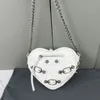 Heart Love Bag Borse a tracolla a catena Borsa del progettista Portafoglio con cerniera Mucca Vera pelle Hardware argento Lettera Stampa Lady Cross Body Purse Alta qualità