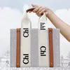 Luxe dames Shopping clutch bags Woody tote heren ontwerpers schouder handtassen crossbody canvas casual grote tas pochette strand reizen klassieke portemonnee plunjezak