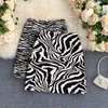 Spódnice koreańskie zebra print midi kobiety jesienne kobieta linia liniowa luźna mini mini 230413