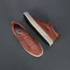 Scarpe eleganti Autunno Moda Hightop Casual Uomo Sneakers piatte in pelle rossa Calzature vulcanizzate antiscivolo con lacci 231113
