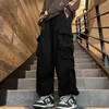 Pantaloni da uomo stile coreano cargo streetwear moda harem pantaloni larghi casual a gamba larga pantaloni da jogging da uomo neri