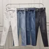 Jeans da donna elastici di alta qualità da donna S con fibbia laterale vita stretta e pantaloni a gamba piccola 2023 abbigliamento donna moda coreana 231110