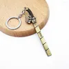 Клавичные атаки на Titan Keychain Eren Key Key Chaine Keyring для мужчин Женские аксессуары аниме автомобиль Кольцо