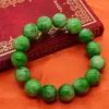 Strandstil naturlig grön kall jadeitarmband mode 10mm pärlor kinesiska hantverk män kvinnor grossist