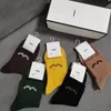 Chaussettes de créateurs pour hommes et femmes Lettre vintage épaissie Marque d'impression Chaussettes de mode Lettre d'automne / hiver pour hommes Chaussettes thermiques à motif tissé