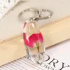 Keychains Natural Presses Flower Resin Leuke kleine toetsen sleutelhangers creatieve gedroogde bloemenaccessoires zoete Koreaanse sleutelhanger