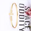 Designer de luxe or T Bracelet femmes en acier inoxydable Couple Rose Bracelet femme cadeaux populaires pour femme accessoires en gros