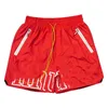 Shorts pour hommes Shorts pour femmes Marque de mode Hip hop alphabet imprimé rouge shorts décontractés pour hommes été ample jambe large basket sport cinq points