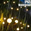 Luci solari lucciola Lampada da giardino a led impermeabile per esterni Lampada da giardino Altalena dal vento Luce solare Alimentata Paesaggio Cortile Decorazione del patio Luci ad energia solare Natale