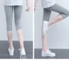 Leggings da donna Leggings elasticizzati sottili da donna Capris da allenamento Femme Pantaloni a 3/4 slim a vita media Pantaloni sportivi corti