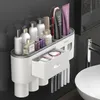 Soportes para cepillos de dientes Soporte montado en la pared con 2 dispensadores de pasta de dientes Almacenamiento de baño sin perforaciones para el hogar Accesorios impermeables 231113