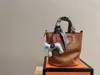 Kadın Lüks In The Loop çanta Omuz çantası Lüks tasarımcı Çapraz vücut çantaları Moda stili Zincir omuz Kovalı çantalar Debriyaj kılıfları berduş cüzdanları cüzdan