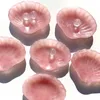 Sacchetti per gioielli La forma lucidata a polvere della ciotola di cristallo di quarzo rosa naturale può essere utilizzata per la smagnetizzazione del braccialetto