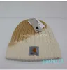 高品質の段階的染色コットン糸秋と冬の揚げ麺ねじれたパターン折りたたみ暖かいニット女性のクールな帽子
