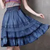 Faldas 2023 moda Primavera todo fósforo Falda vaquera de retazos Casual cómodo Color sólido mujeres hasta la rodilla volantes