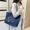 Bolsos de noche bolso de hombro bordado Vintage 2023 moda al aire libre compras portátiles de gran capacidad bolsos de mano de mezclilla para mujer