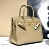 Platinum Designer TOTE Bag Wysoka jakość temperamentu dla kobiet Przenośna Lichee Grain High-end Top Togo Cowno-Cow Banks