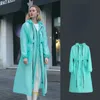 Raincoats kvalitet Kvinnor Stylish Long Raincoat Waterproof Rain Jacka med huva Regnrock Män