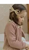ジャケット秋の韓国の子供の女の子ウエスタンスタイルのラペルレースニットカーディガンコート