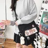 Avondtassen vrouwen vintage messenger zakje grote capaciteit Koreaans college vrouwelijke handtas badge hanger multi-pocket voor reizen dagelijks