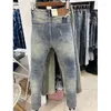 Jeans da uomo 2023 Autunno Streetwear Designer Maschi Marca Strappato Stampa Jean Uomo Hip Hop Hole Personalità Pantaloni Skinny