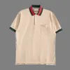 Designer Summer Mulher camiseta camisa teto de teto solto casual antigo manga de manga polo homens homens