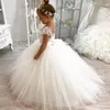 Vestidos de flor de flores brancas de renda branca para casamentos crianças com tulle bobo de tulle bola de pegolas de pegolas