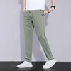 Pantalon pour hommes 2023 été décontracté mince doux sport poche zippée corée gris noir élasticité à lacets taille jogging pantalon de travail mâle