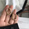 Boucles d'oreilles créoles couleur or géométrique en forme de U pour femmes et hommes, Punk hip-hop en métal, cercle rond, bijoux de fête, vente en gros