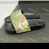 Luxe platte muilezelpantoffels Dames Heren Zomerdia's Designer Outdoor Vrouwelijke sandalen Klassieke rubberen schoenen