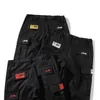 Pantalon cargo mens streetwear hip-hop pantalon décontracté imprimé militaire multi-poches saut