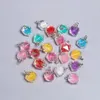 ペンダントネックレス10pcs 21x15mmビーズのポリゴンアクリルの小さなチャームサイズ8色