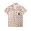 Camicie casual da uomo stampa geometrica africana spiaggia uomo 2023 marca manica corta camicia hawaiana floreale tropicale abbigliamento per le vacanze