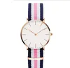 2023 Simple Women's Watch Quartz bekväm duk svart röd vit blå armband rem montel designer kvinnor enkel avslappnad favorit valentins dag jul