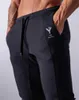 Herenbroek JP uk lyft2022 Men sport loopbroek zakken atletische training kant zipper broek elasticiteit legging jogging gym broek w0414