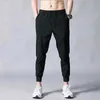 Pantaloni da uomo Pantaloni di seta del ghiaccio pantaloni da uomo pantaloni sottili estivi pantaloni sportivi ad asciugatura rapida pantaloni casual larghi da uomo vita da uomo pantaloni a nove punti W0414