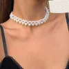 Kedjor utsökta barock imitation pärlpärla kvinnor kort choker halsband söt hand stickad bröllop fest gåva smycken klavikel