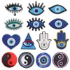 Inne mieszane 50pcs Pvc Devil Eyes Buty Charms Eye Heart Hand Tai Chi Bluckle Clog Ornaments Croc Jibz Fit Torterna Dekoracje dla dzieci Otzlo